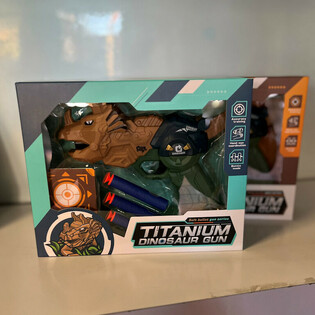 DINOSAUR GUN - DINOSAURUS PISTOOL MET PIJLEN EN TARGET - IN GIFTBOX (2st.)